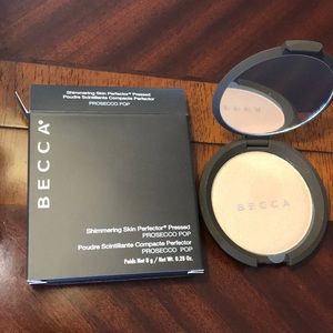 Becca shimmering skin perfector pressed Highlight